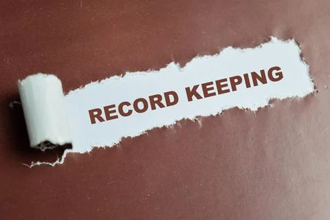 Record keeping text written in torn paper. For organized documentation Stock Photos