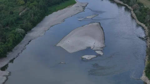 Record low Po River level exposes vast sandbanks during severe 2026 summer Stock Footage 340604033