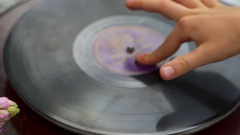 Record player and turn table for children. Kids music from a gramophone Stock Footage 196218739