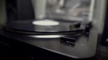 Record player coming to a stop at night Stock Footage 86131716