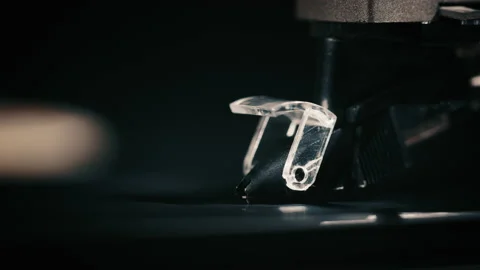 Record player head and stylus on a record Stock Footage 130313859