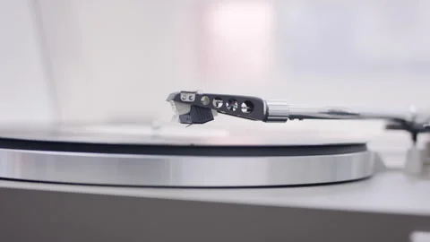 Record player needle lowers onto vinyl Video stock 137630618