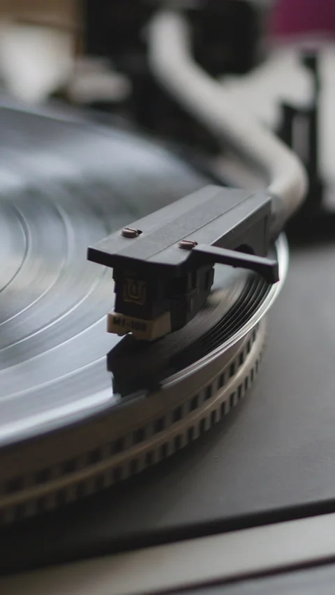 Record Player Needle On Spinning Black Vinyl Record. Vertical. Video stock 302552370