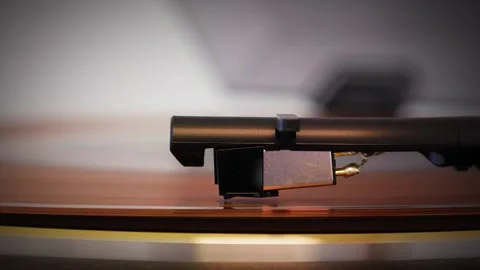 Record player stylus tracking across spinning vinyl record Stock Footage 320336207