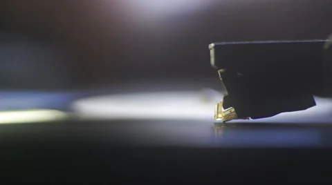 A record player turntable with it's stylus in extreme close. 4K stock footage Stock Footage 65439172