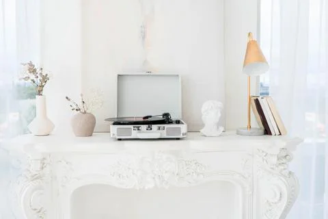 Record player with vinyl disc on table in room Stock Photos
