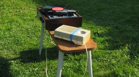 Record player with vinyl record  instead of the speaker old radio , outdoors Video stock 41550062
