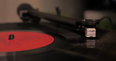 Record Player with vinyl is turned on and needle is dropped. Video stock 140265175