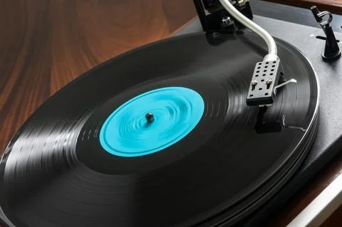 Record player, vinyl turntable record player, while playing the record. Clo.. Stock Photos