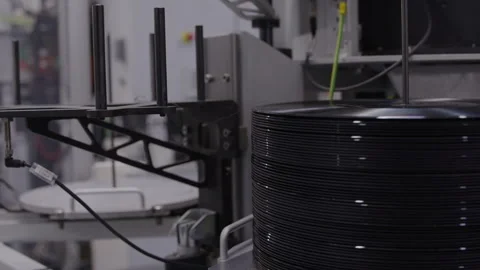 Record pressing plant stack of vinyl Stock Footage 331345018