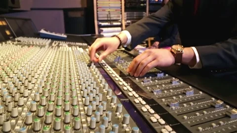 Record Producer Professional Audio Engineer at Work Sound Board Dials Studio Stock Footage 80166595