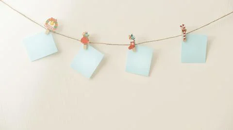The record sheets are hung on a string with clothespins as New Year's gifts Stock Photos