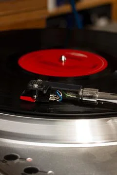 Record usb player turntable with its stylus running on record. Retro style. Stock Photos