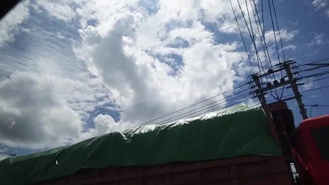 Recording clouds from inside the car Stock Footage 305016042