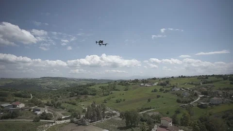Recording a dji inspire drone while flying at italian landscape Stock Footage 71279281