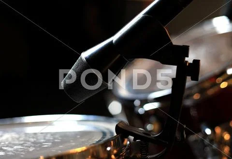 Recording drum with vintage microphone Stock Photos