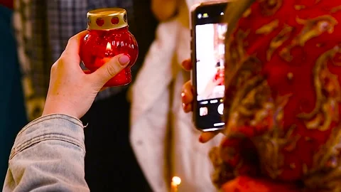 Recording a lit candle with a smartphone. Video stock 341790260