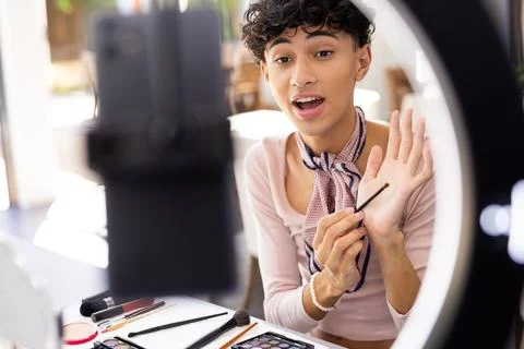 Recording makeup tutorial, transgender transgender woman using smartphone and 写真素材