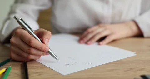 Recording math exercises student solves problem closeup Stock Footage 241657318