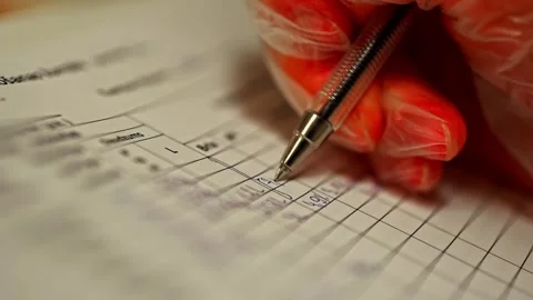 Recording Production Data by Hand on Process Control Sheet Video stock 332562364