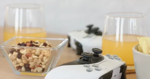 At recording start, camera is alternating focus between game controller and Stockbeeldmateriaal 337624362