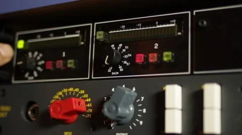Recording Studio - in the Control Room - Adjusting preamp Video stock 65317538