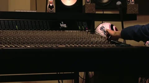 Recording studio, hand on mixer Stock Footage 213634300