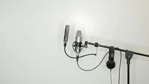 Recording Studio Microphone and Headphone with White Background Stock Footage 91870612