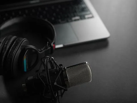 Recording studio, radio studio. Studio microphone and headphones on a laptop  Stock Photos