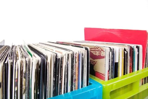 Records in plastic boxes on white 写真素材