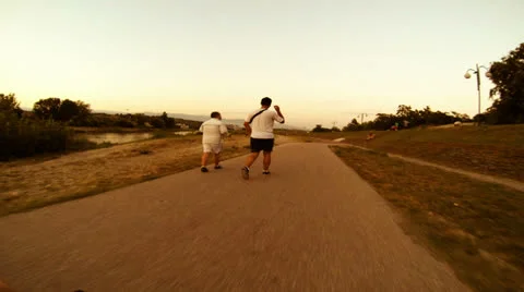 Recreation biking and jogging Stock Footage