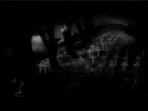 Recreation of  bombs exploding in cemetery at night during war, 1930s 스톡 동영상 58858735