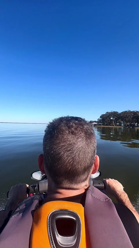 Recreational Jet Ski Fun on a Sunny Summer Lake Stock Footage 295816853