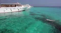 Recreational marine boat with glass bottom in the blue lagoon, Latchi, Cyprus HD Footage