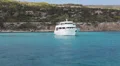 Recreational marine boat with glass bottom is in the blue lagoon HD Footage