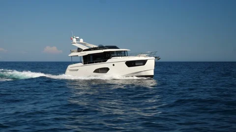 Recreational trawler navigating fast. Stock Footage 121249010