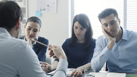Recruitment team examining a boring talkative candidate Stock Footage 108421143