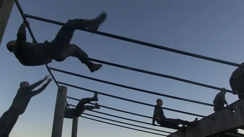 Recruits receive instructions from their instructors about obstacle course -2016 Video stock 88629365