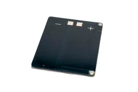 Rectangle 6 volt solar panel with yellow and black wire isolated on white Stock Photos