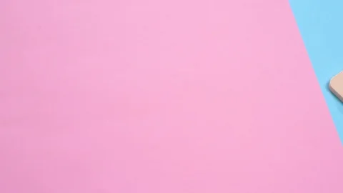 Rectangle eyeshadow and a powder puff put on table Stock Footage 87933913