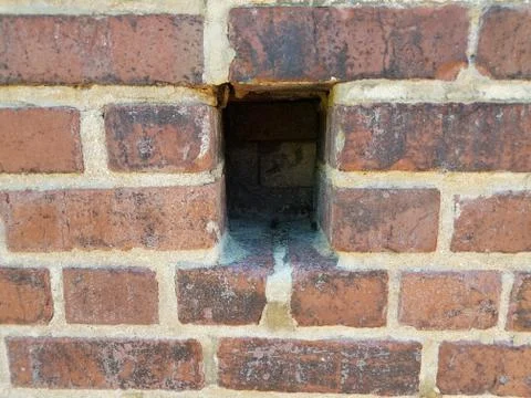 Rectangle hole in red brick wall or masonry Stock Photos