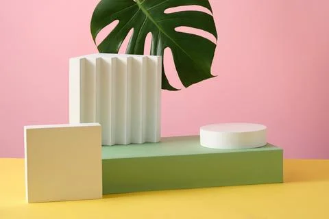Rectangle podium with a round podium stacked on and a square podium beside. M Stock Photos