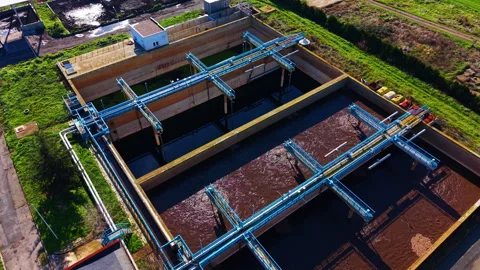 Rectangular aeration tanks with blue walkways. Vídeos de archivo 326135314