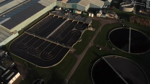 Rectangular and circular shapes of a water reservoir treatment facility Stock Footage 145759606
