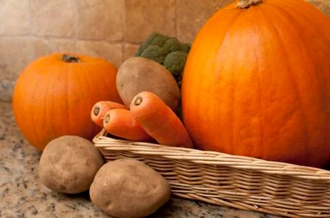 Rectangular basket filled with winter vegetables Stock Photos