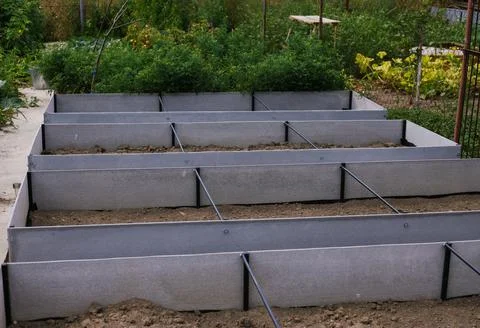 Rectangular beds in the garden made with your own hands. Convenience in plant Stock Photos