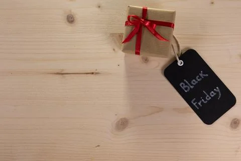 A rectangular black label bearing the words Black Friday alongside a small .. 库存照片