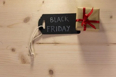 A rectangular black label bearing the words Black Friday alongside a small .. Foto stock