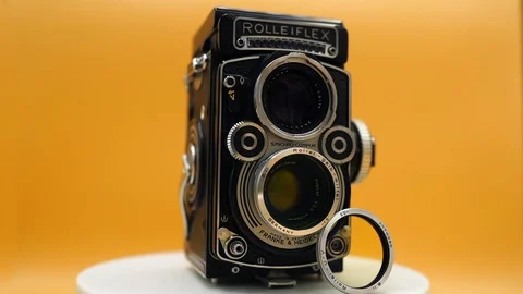 Rectangular black metalic camera with small lens Stock Footage 107561027