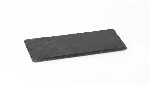 Rectangular black slate stone board isolated on white background, utensils fo Stock Photos